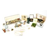 A collection of costume jewellery to include brooches, earrings, necklaces, bracelets, etc.