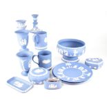 A quantity of Wedgwood light blue jasperware to include a covered cheese dish, a footed bowl,