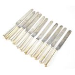 Eleven silver-handled table knives, reeded 'Old English Pattern' matched set, marks rubbed,