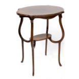 A mahogany oval-topped occasional table with undershelf, on scroll and tapering legs,