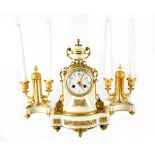 An Empire-style alabaster and gilt metal clock garniture,