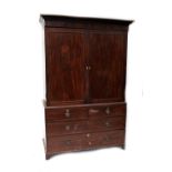 A George III mahogany linen press,