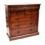 A Victorian mahogany Scottish chest of six drawers with turned wooden handles, on a plinth base,