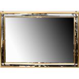 A modern gilt-framed mirror with bevelled mirror tile decoration to edge, 74 x 104cm.