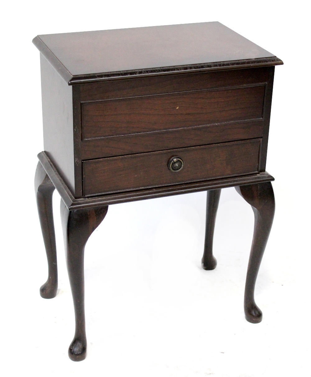 A Georgian-style stained wood sewing table with lift-up lid and single shelf on cabriole legs,
