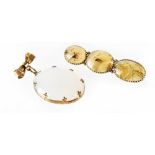 A 9ct gold pendant brooch set overall cabochon hardstone in a mount with fleur-de-lis claws and a