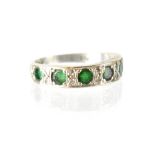 An 18ct white gold and emerald half eternity ring set with six small emeralds, size M, approx 4.6g.