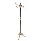 A reproduction gilt brass coat stand with scrolling fan-shaped branches,