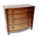 A 19th century mahogany bow-fronted chest of four graduated drawers with wrythen twist pilasters