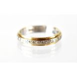 A ladies' 9ct gold fashion ring with raised white gold band, size Q, approx 2.9g.