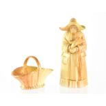 A Royal Worcester blush candle snuffer in the form of a nun, puce mark dated 1897,