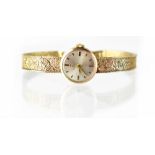 Tissot; a ladies' vintage 9ct gold wristwatch,