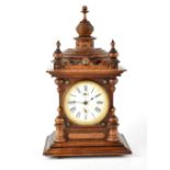 An early 20th century oak-cased mantel clock,