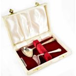 An Elizabeth II cased set of hallmarked silver child's spoon and pusher, Angora Silver Plate Co Ltd,