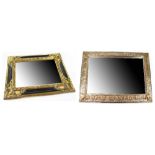 Two contemporary gilt-framed decorative wall mirrors, one with grape and vine decoration,