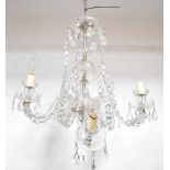A five-branch cut glass chandelier, central column with baluster and ball decoration,