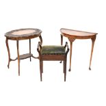 An Edwardian mahogany demi-lune hall table on three tapering supports to pad feet,