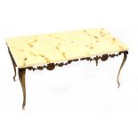 An onyx-effect and gilt metal occasional table with rectangular top, on slender outswept legs,