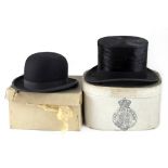An Edwardian Christy's London hat box containing a gentlemen's top hat with the interior Christy's