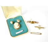 A 9ct gold cameo brooch with necklace hoop and a pair of gilt cameo earrings,