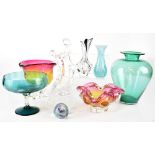 A group of decorative glassware to include a large green glass footed Champagne bowl,