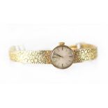 Omega; a 9ct gold ladies' wristwatch, the dial set with baton numerals,