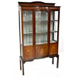 An Edwardian mahogany inlaid display cabinet, central bow front astragal glazed door,