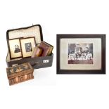 A vintage suitcase containing two hand painted Edwardian photographs,