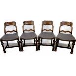 A set of four 1930s oak dining chairs with carved back rests and studded upholstered seats,