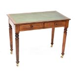 An early/mid-20th century oak writing desk,