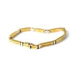 A modern 9ct two-tone gold bar link bracelet, length 18.5cm, approx 10.5g.