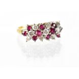 An 18ct gold diamond and ruby ring,