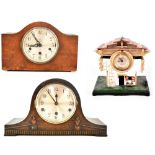 Two mid-20th century Napoleon hat mantel clocks, one oak example,