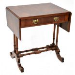 A reproduction Regency sofa table with single drawer and pierced brass drop handles,
