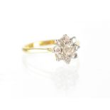 A Boodle & Dunthorne 18ct yellow gold diamond floral cluster ring, size O, approx 2.7g.