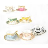 Seven Shelley cabinet cups and saucers, six matching pattern, various colours, registration no.