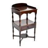 An Edwardian mahogany wash stand of small proportions, one central drawer and lower circular shelf,