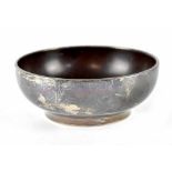 A 1940s hallmarked silver bowl with brown Bakelite interior, height 4cm, diameter 11cm,