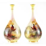 A pair of Royal Worcester vases of gourd form, hand painted with pheasants by Albert Shuck, signed,