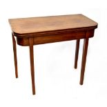 A Regency inlaid mahogany fold-over tea table on square tapering legs, height 76cm, width 91cm,