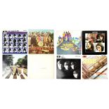 Eight Beatles LPs, all reissues from the 1980s,