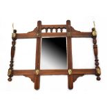 An Edwardian beech wall-hanging mirrored hat stand,