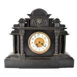 A 19th century mausoleum slate mantel clock,