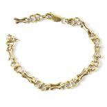 A 9ct gold fancy link bracelet, length 20cm, approx 10.5g (af).