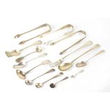 Fourteen various hallmarked silver items, to include a pair of sugar tongs by John Shekleton,