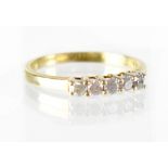A 9ct gold five-stone diamond ring, diamonds approx 0.33ct total, size O, approx 2.2g.