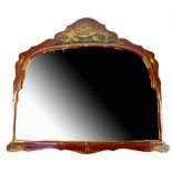 A Chinese red lacquered mirror, the frame with gilt figures in a garden landscape with pagoda,