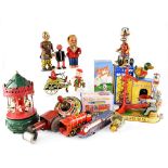 A collection of vintage and modern tinplate toys to include a Chinese dog on a bike, a tractor,