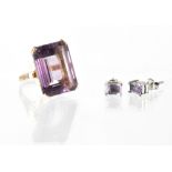 A 9ct gold large amethyst dress ring, size O, also a pair of amethyst and silver earrings (2).