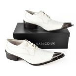Gucinari; a pair of gentlemen's white faux snakeskin leather shoes with pointed metal toe cap,